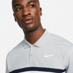 Nike Dry Victory Colourblock Golf Polo Shirt 10 Nike Dry Victory Colourblock Golf Polo Shirt -Golf Gear Sales Nike SS22 Dry Victory Colourblock Golf Polo Shirt DH0845 077 M Smoke Grey Obsidian White model 2